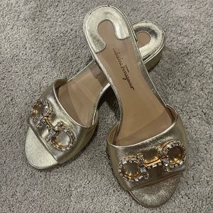 Salvatore Ferragamo gold slides